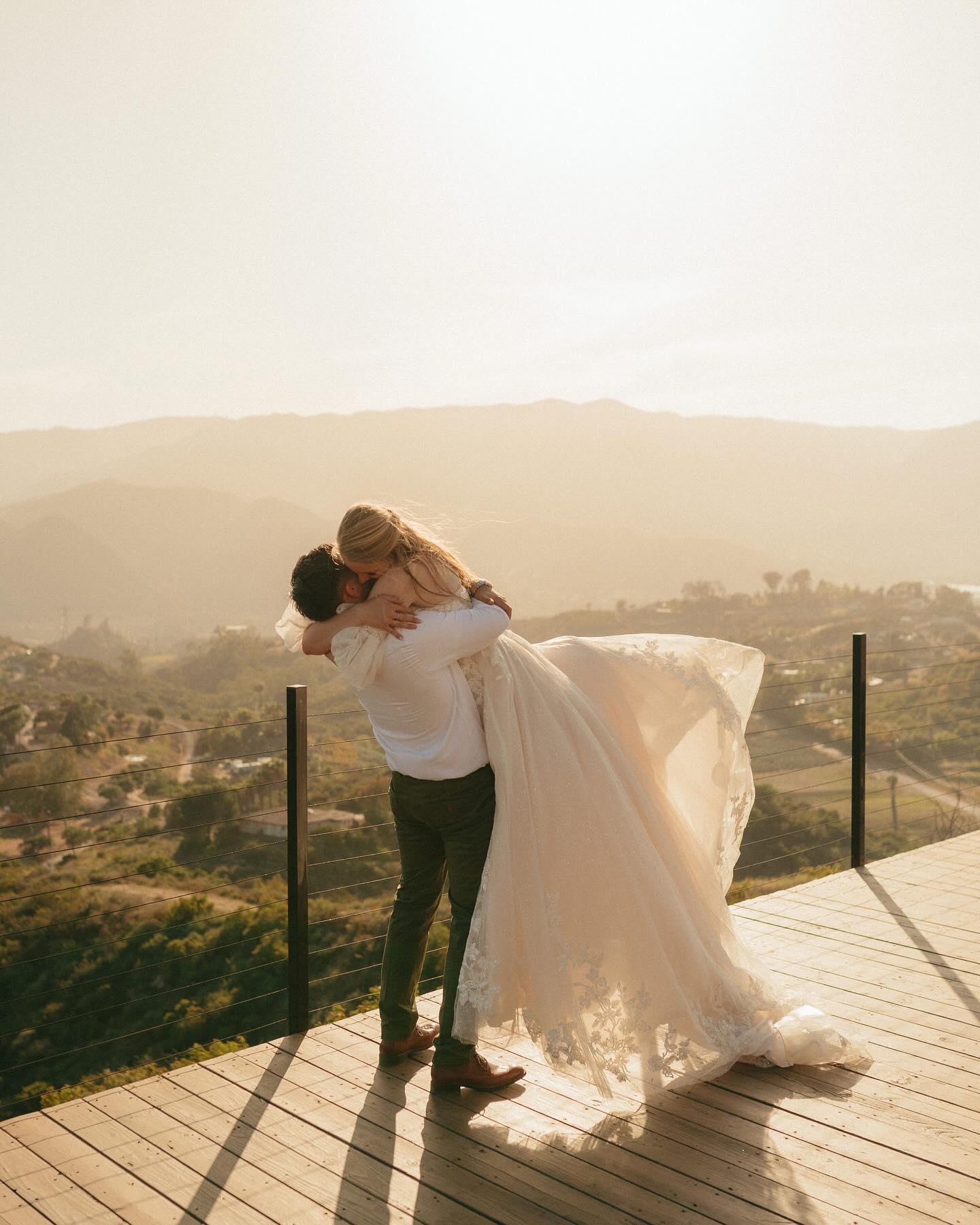 Couple in a quiet, candid moment together at their reception