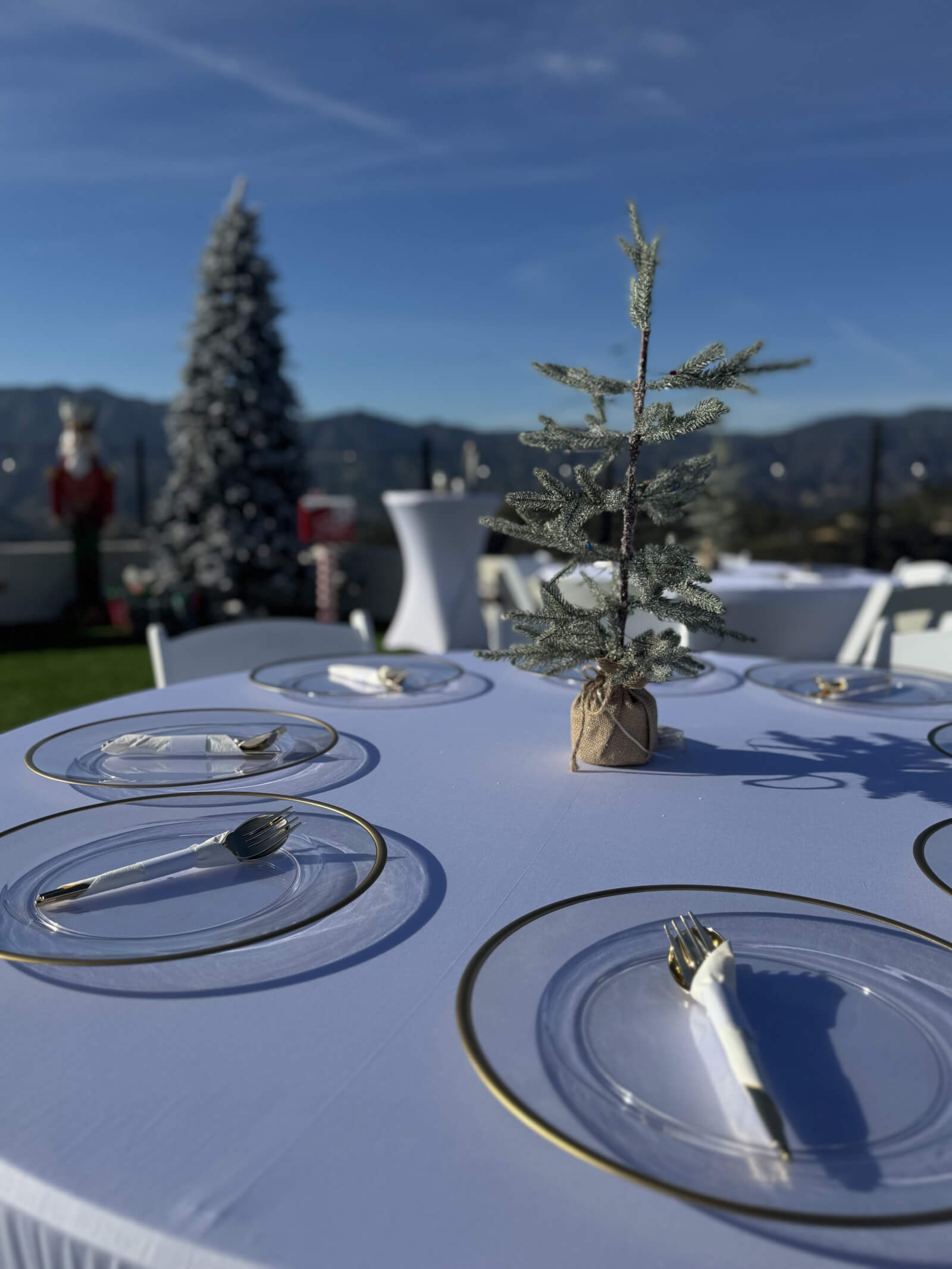 Festive holiday party table set with warm light